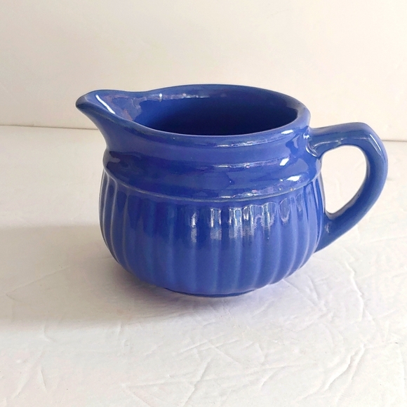 VNTG. Cobalt blue creamer with USA stamp.